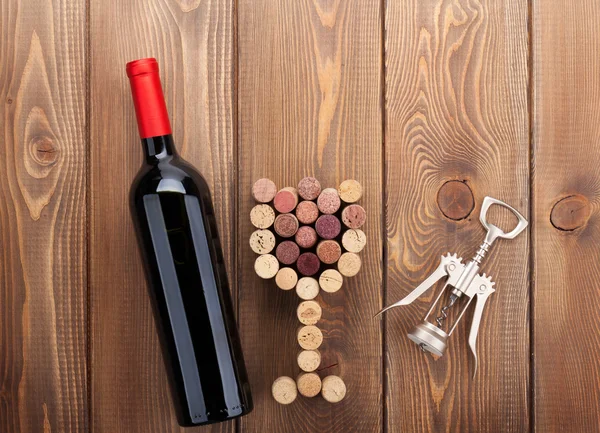 Glass shaped corks and corkscrew — Stock Photo, Image