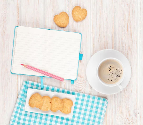 Coffee, heart shaped cookies and notepad — Stock Photo, Image