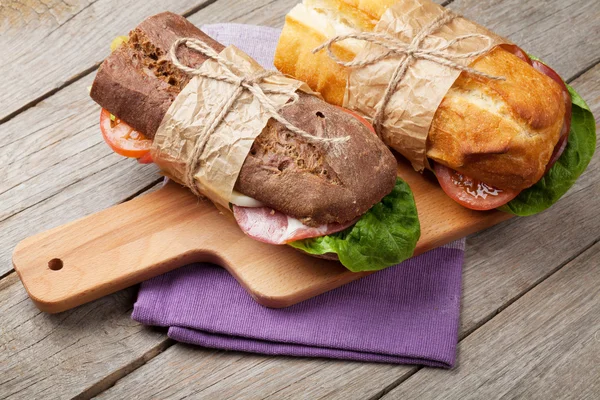 Two sandwiches with salad, ham — Stock Photo, Image