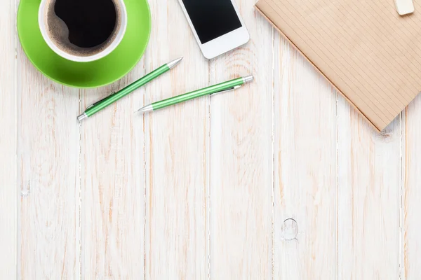 Office desk table with coffee cup — Stock Photo, Image