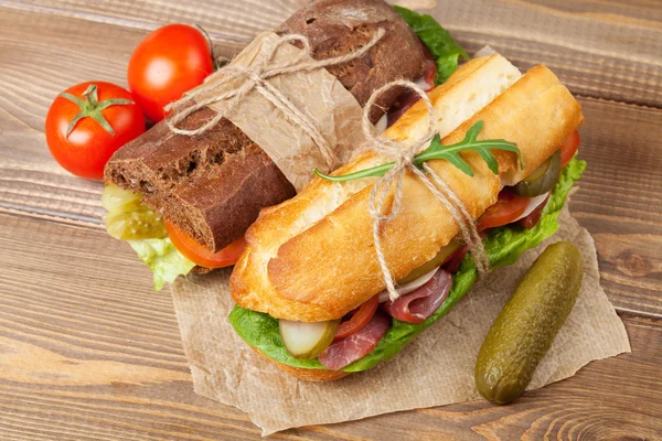 Two sandwiches with salad, ham, cheese — Stock Photo, Image