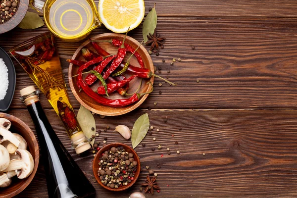 Various spices on wooden background — Stock Photo, Image