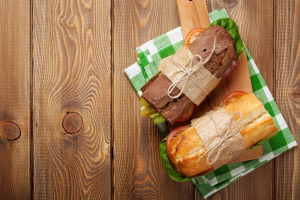 Two sandwiches with salad, ham, cheese — Stock Photo, Image