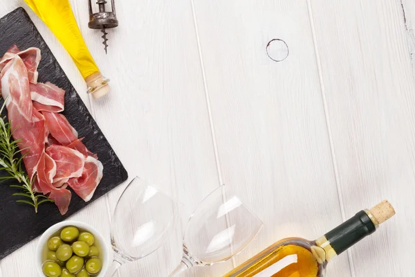 Prosciutto, wine, olives and olive oil