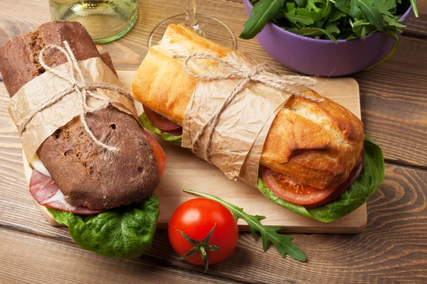 Two sandwiches with salad, ham, cheese — Stock Photo, Image