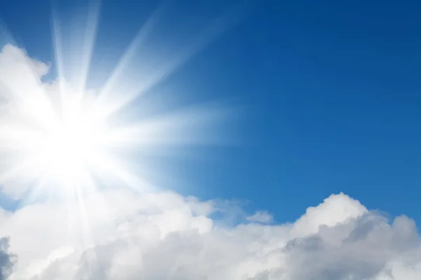 Blue sky with clouds and sun — Stock Photo, Image