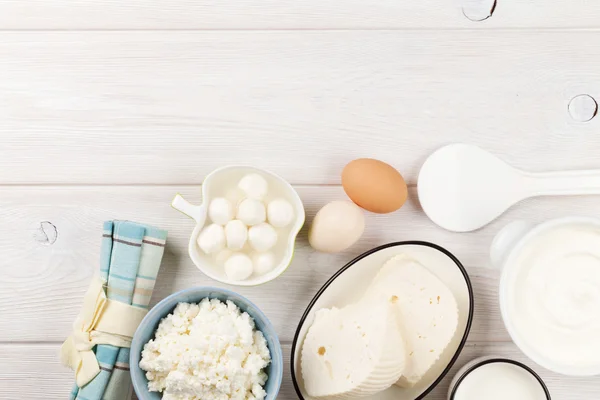 Sour cream, eggs and yogurt — Stock Photo, Image