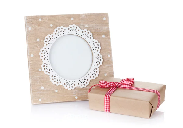 Photo frame and gift box — Stock Photo, Image