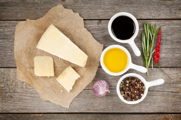 Parmesan cheese, herbs and spices — Stock Image Parmesan cheese, herbs and spices Stock Photo