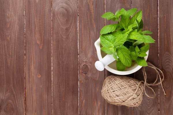 Fresh mint in mortar — Stock Photo, Image