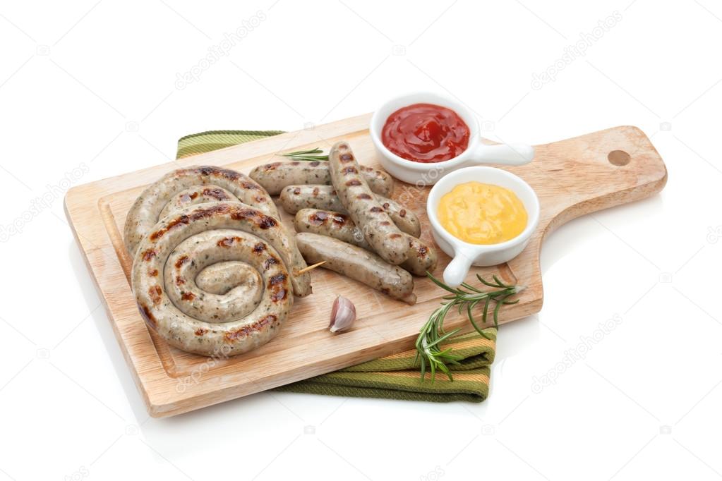 Grilled sausages with ketchup and mustard