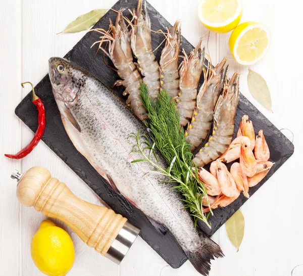 Fresh raw sea food with spices — Stock Photo, Image