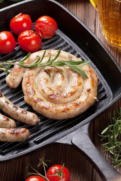 Grilled sausages and beer mug — Stock Photo, Image