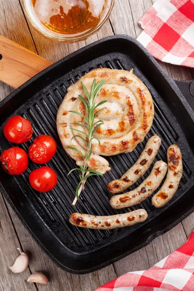 Grilled sausages and beer mug — Stock Photo, Image