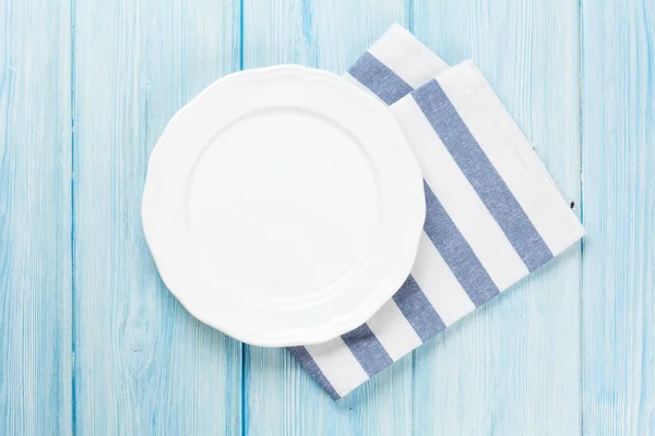 Empty plate over table background — Stock Photo, Image