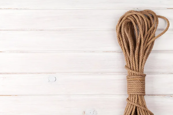 Wooden background with marine rope — Stock Photo, Image