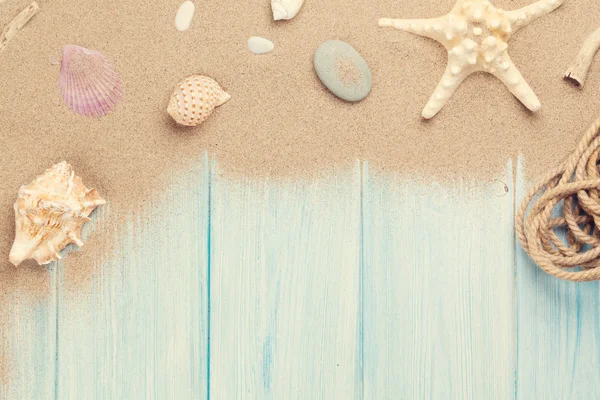 Sea sand with starfish and shells — Stock Photo, Image