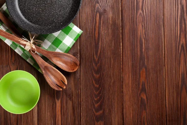 Cooking utensil on wooden table — Stock Photo, Image