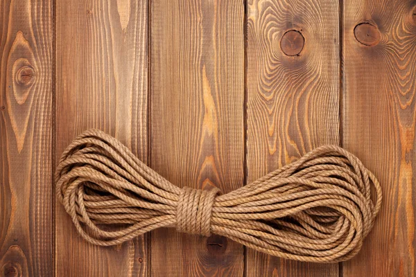 Wooden background with marine rope — Stock Photo, Image