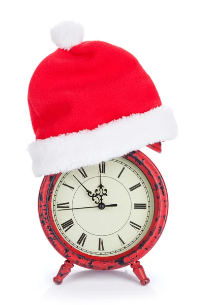 Noel Baba şapkası ile Noel saat — Stok fotoğraf