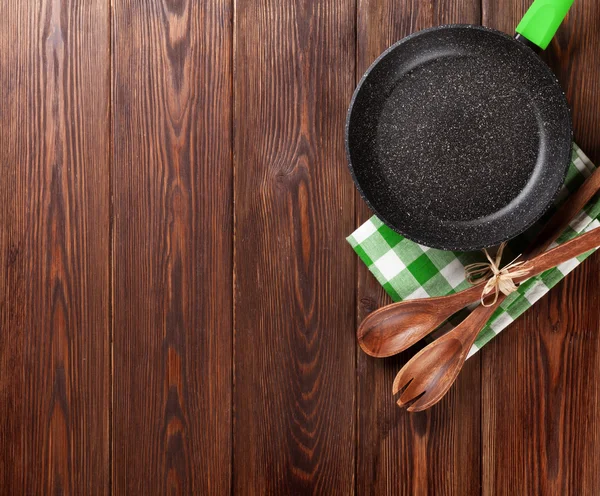 Cooking utensil on wooden table — Stock Photo, Image