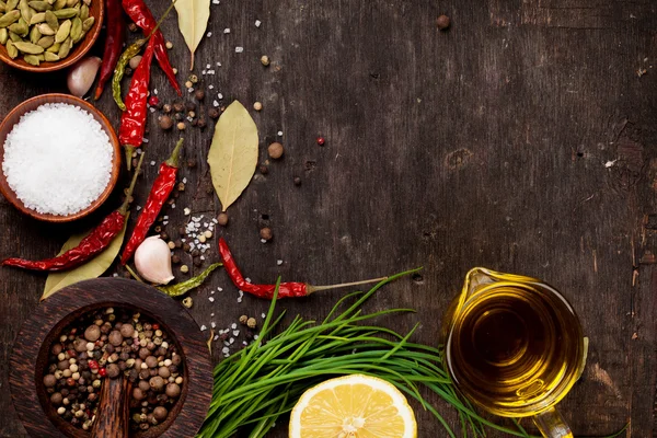 Various spices on wooden background — Stock Photo, Image