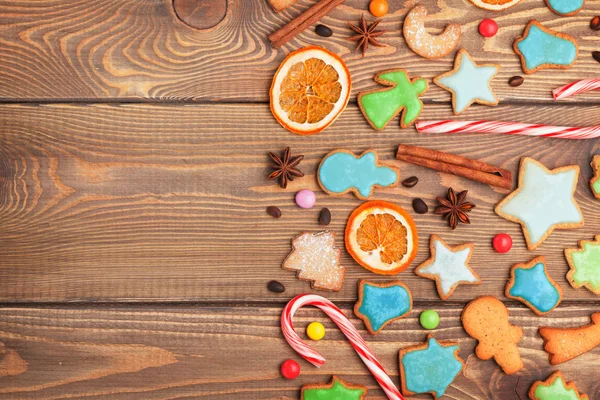 Weihnachten Holz Hintergrund mit Bonbons — Stockfoto