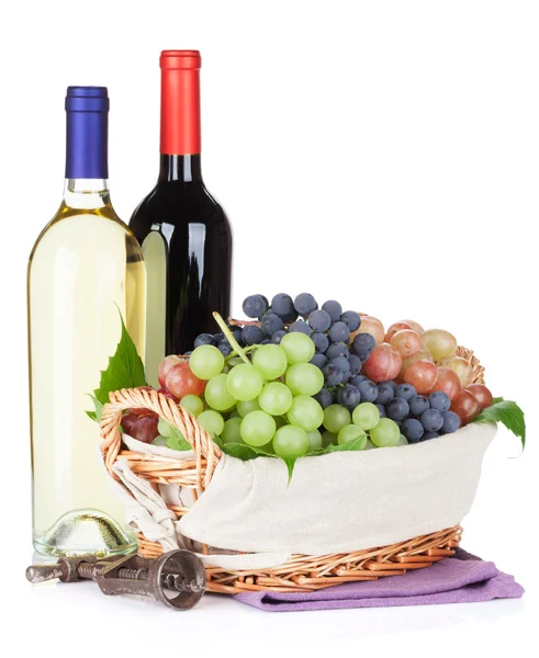 White and red wine bottles and grapes — Stock Photo, Image