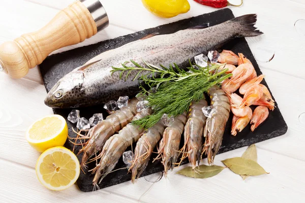 Fresh raw sea food with spices — Stock Photo, Image