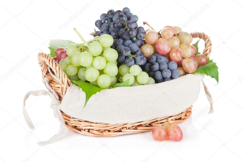 Colorful grapes in basket