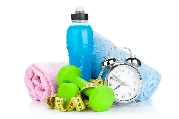 Two green dumbells, tape measure, drink bottle and alarm clock — Stock Photo, Image