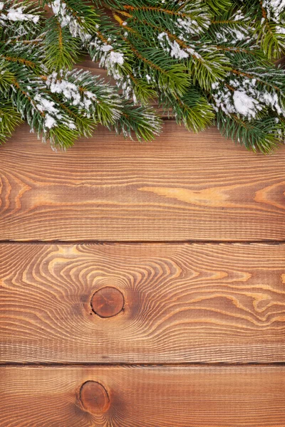 Christmas fir tree on wooden boards — Stock Photo, Image