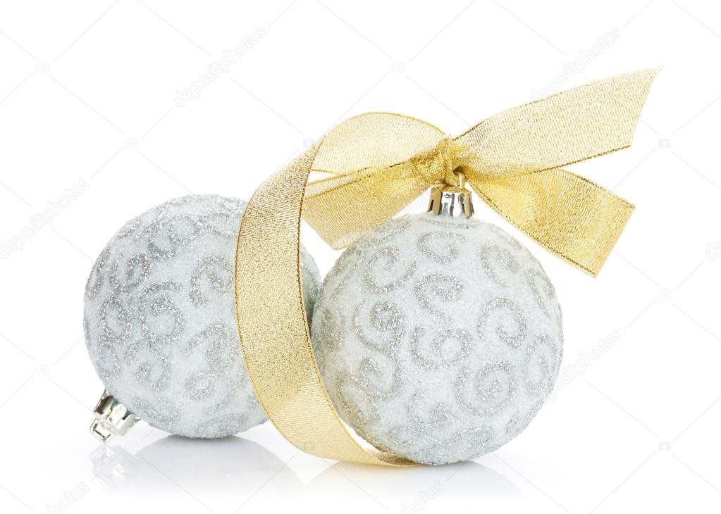 Christmas baubles and golden ribbon