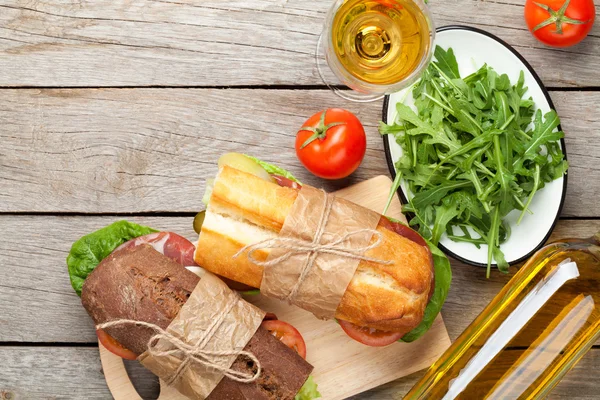 Two sandwiches and white wine — Stock Photo, Image