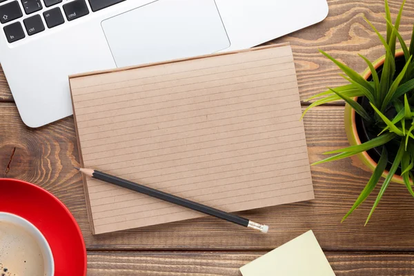 Office table with computer, supplies, coffee — Stock Photo, Image