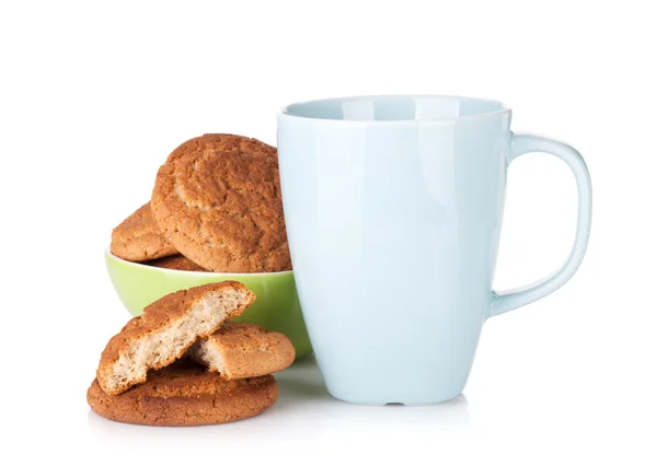 Cup and bowl with cookies — Stock Photo, Image