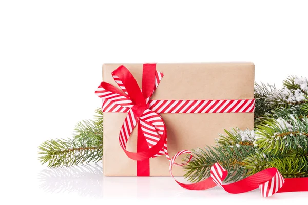 Christmas tree branch and gift box — Stock Photo, Image