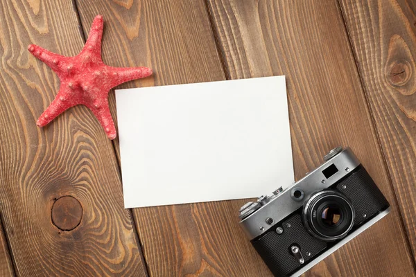 Dovolená fotorámeček, hvězdice a fotoaparát — Stock fotografie