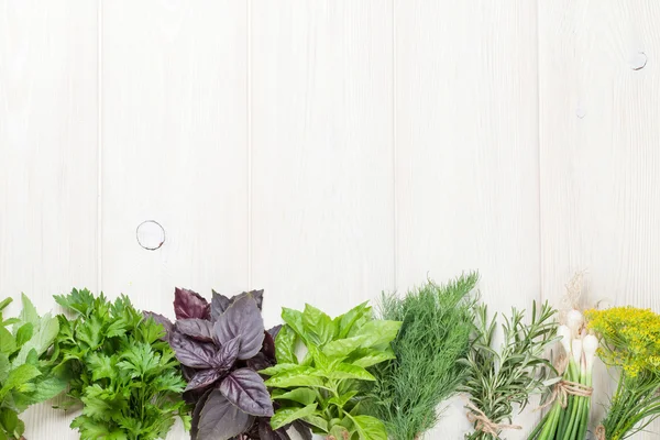 Fresh garden herbs  on wooden table — Stock Photo, Image