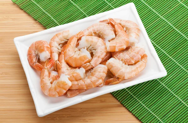 Cooked shrimps on wooden table — Stock Photo, Image