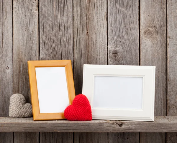 Blank photo frames and heart gifts — Stock Photo, Image