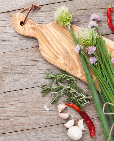 Fresh herbs and spices on garden table — Stock Photo, Image