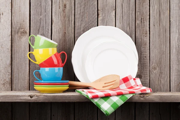 Kitchen utensils on shelf — Stock Photo, Image