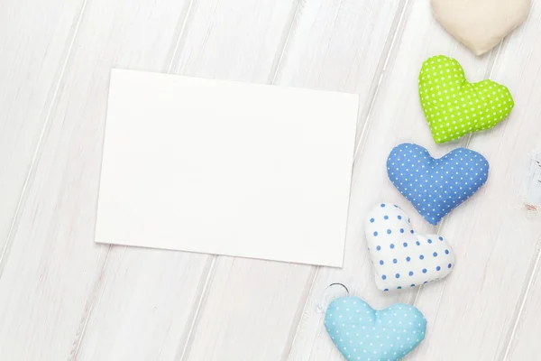 Greeting card and valentines toy hearts — Stock Photo, Image