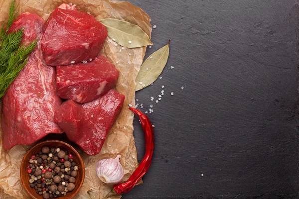 Raw fillet beef steak and spices — Stock Photo, Image