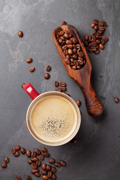 Koffiekopje en bonen — Stockfoto