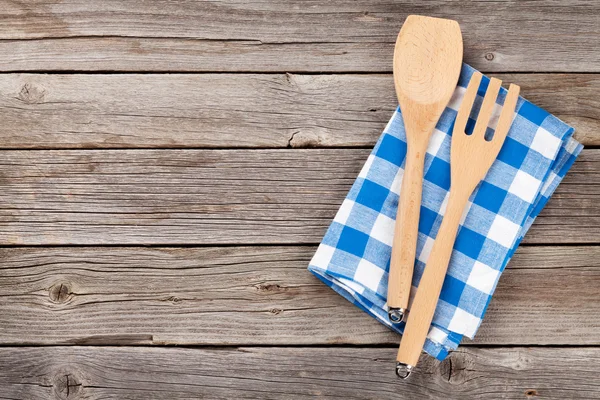 Cooking utensils on wooden table — Stock Photo, Image