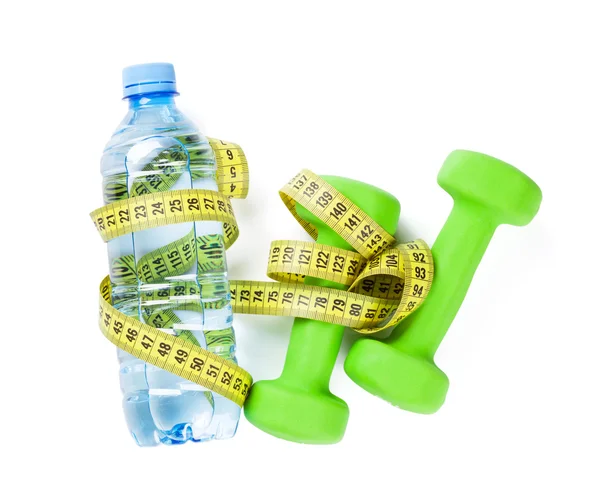 Dumbbells, water and tape measure — Stock Photo, Image