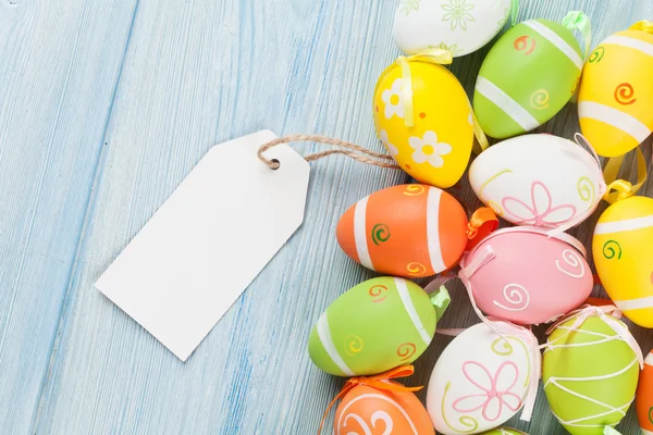 Paskalya yumurtaları ve boş etiket — Stok fotoğraf