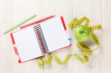 Defter, mezura ve elma